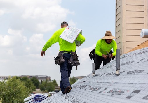 Dynamic Roofing working on Roof copy